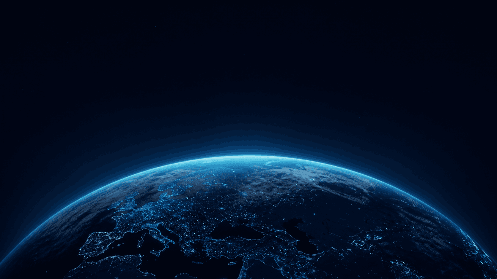 Blue illuminated Earth emerging from deep space